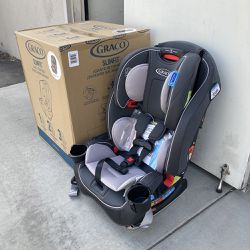 $145 (New) Graco slimfit 3 in 1 car seat, slim & comfy design saves space for child 5 to 100lbs, redmond 