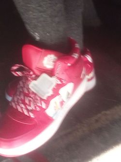 Red Nike Sneakers with Patterned Laces