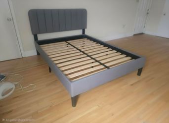 Fairly used grey bed frame