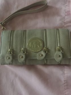 Just in time for Mother's Day Michael Kors wallet wristlets asking $30.00