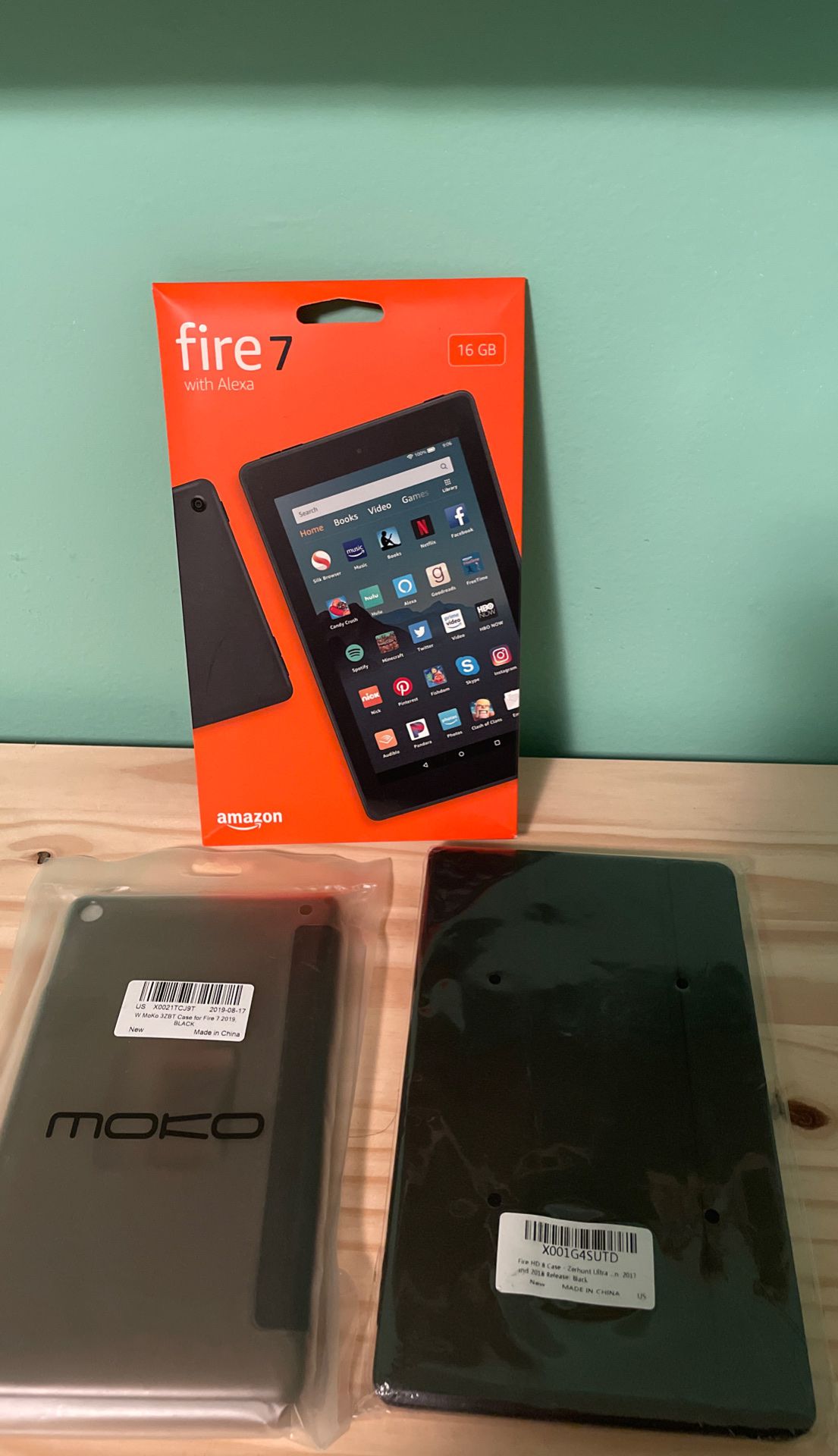 Fire 7 tablet with two cases