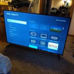 Roku 55" smart tv (no blotches or white spots.) 