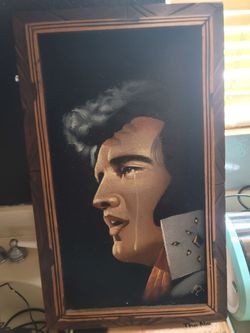 Vintage framed black velvet painting of a crying Elvis Presley holding an ace of spades card, likely produced in Mexico during the 1970s