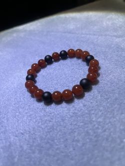Red and Black Beaded Bracelet with Polished Finish 