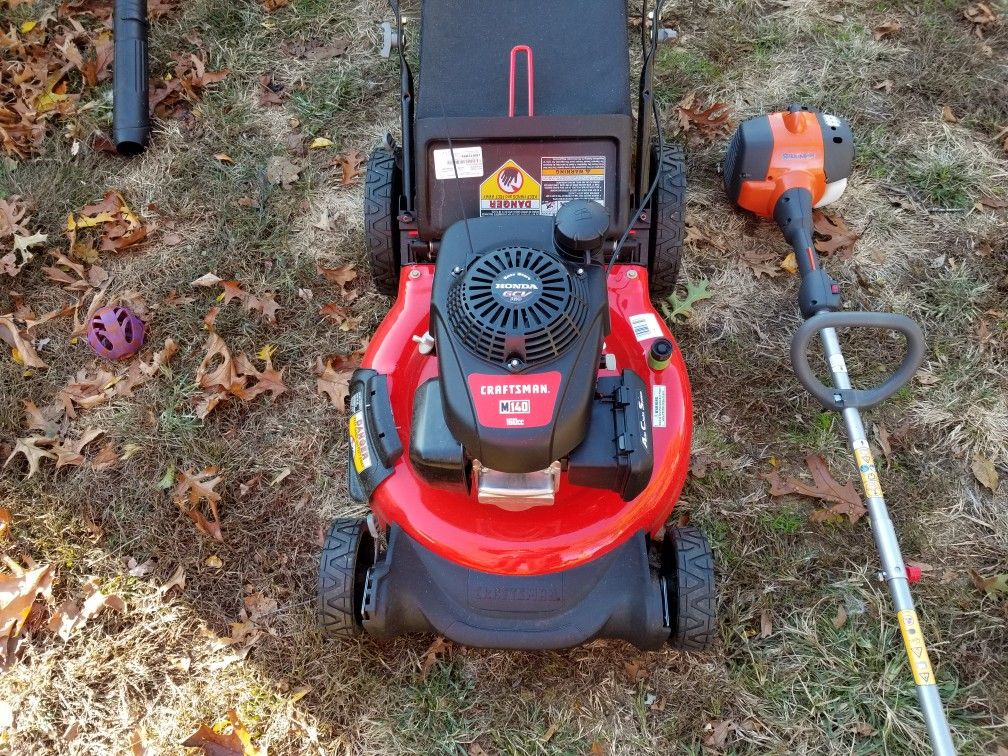 Lawn mower/trimmer combo