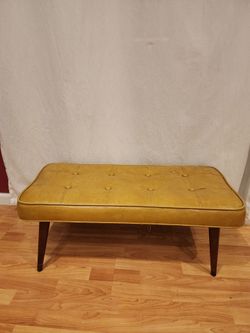 Vintage yellow upholstered bench