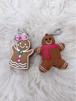 Bath&BodyWorks gingerbread man and woman pair. Hand sanitizer holders