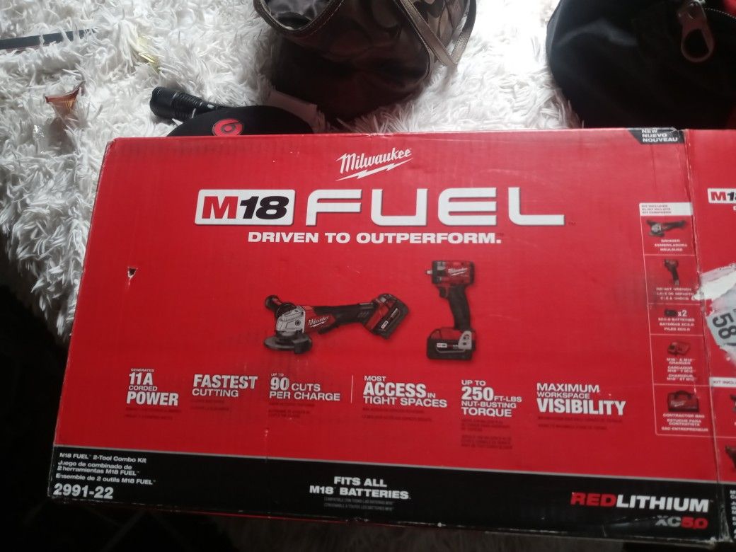 Milwaukee 3/8 Impact And Grinder Cordless Comes With Batteries And Charger And Bag
