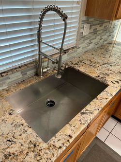 Undermount stainless steel sink with faucet