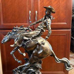 HORSE AND COWBOY STATUES