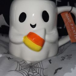Ghost Mug Holding Candy Corn