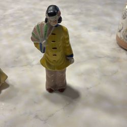 Vintage Japanese lady holding a fan