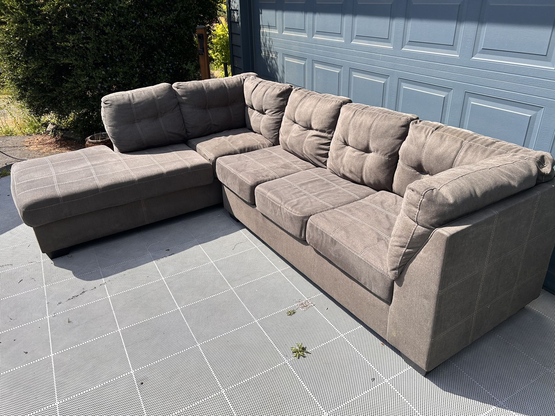 Delivery available - Large gray sectional couch