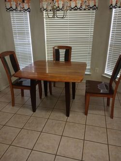 Small dining table with 4 matching chairs