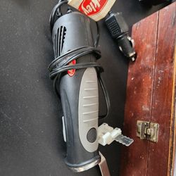 Vintage Berkley fish fillet with blades and car adapter