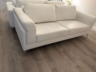 Free faux-leather white sofa couch