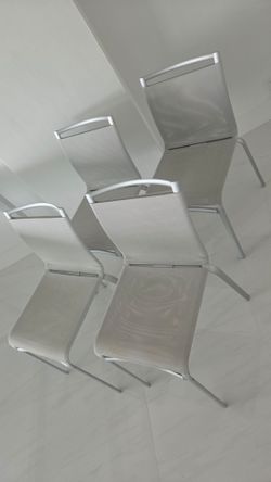 4 grey modern chairs
