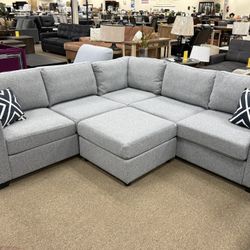 2 COLOR GRAY & CREAM FREE OTTOMAN $750.00