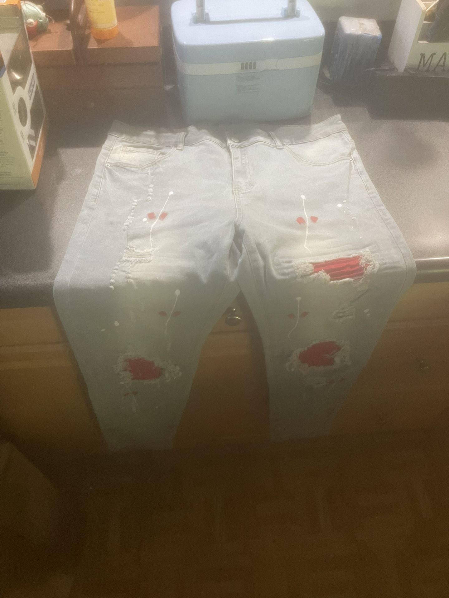 Light blue with white and red rips