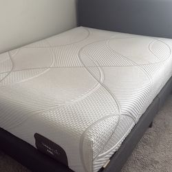 Queen bed with mattress and one side table with built in USB charger
