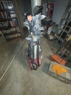 $100 or b o ..Clubs And Bag
