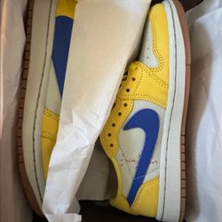 Travis Scott Jordan 1 Low Canary 