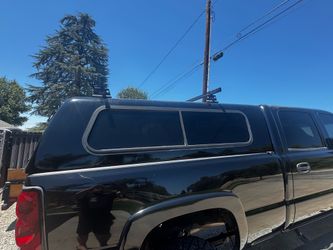 Black Truck Camper Shell with Roof Rack