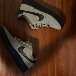 Nike Air Force 1 Low in black and Green 