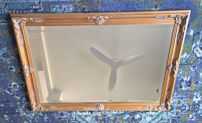 Ornate Wooden Mirror Flourish Design