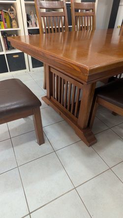 Solid wood dining table and 6 chairs