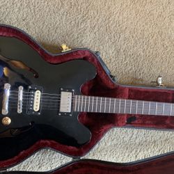 Epiphone  Electric Guitar.  Semi-Hallow 