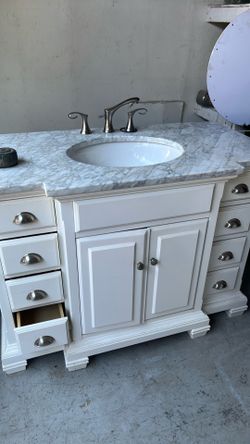 Complete vanity  with countertops  45.5” wide and facet