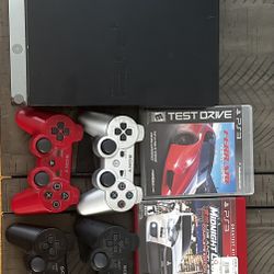 PS3 W/ 4 controllers and 3 Games