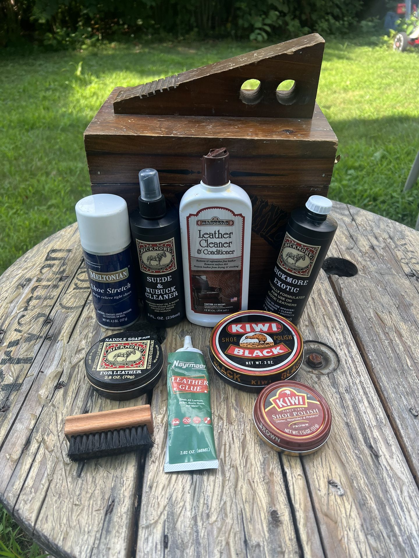 vintage wooden shoe shine box and supplies