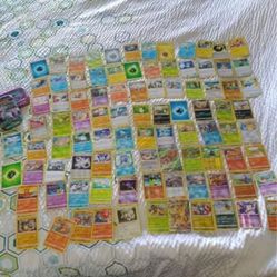 $20–POKEMON CARD SET WITH TIN CASE HOLOGRAM CARDS—$20