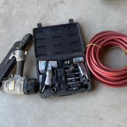 Pneumatic chisel, ratchet set with hose and carpenter’s framing gun. 