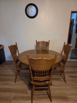 Oak dinner table and chairs