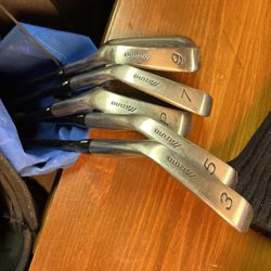 Assortment of Mizuno golf irons