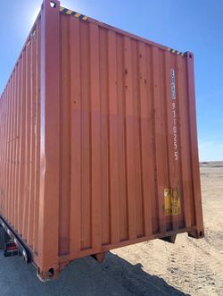 Orange 40' High Cube Container — Used, Extra Height, Delivery Available