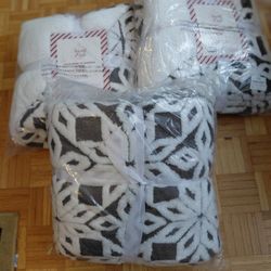 3 Mink To Sherpa Reversible Throw Blanket 50x60 , 100 % Polyester Grey And White Snowflake Design on One Side And White Sherpa Material On Other Side.