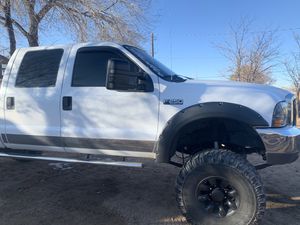 Photo Ford F-250 super duty 299000 miles 10 inch lift