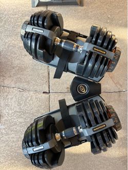 Nautilus dumbbell weights with cradle, stand and Grip Weight bench