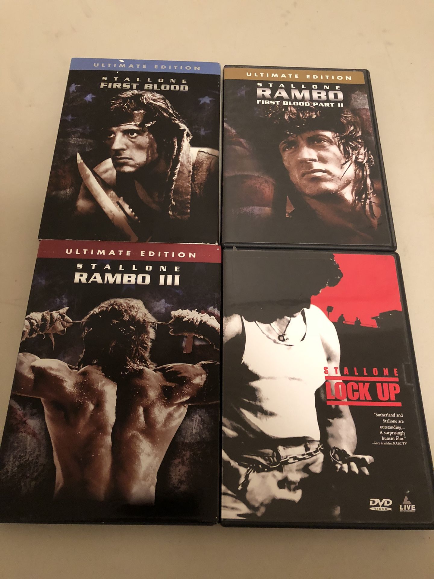 4 DVDS of Sylvester Stallone $2. Ea.