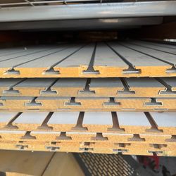 3/4x4x8 aluminum slotted white  MDF wallboard $20/sheet used