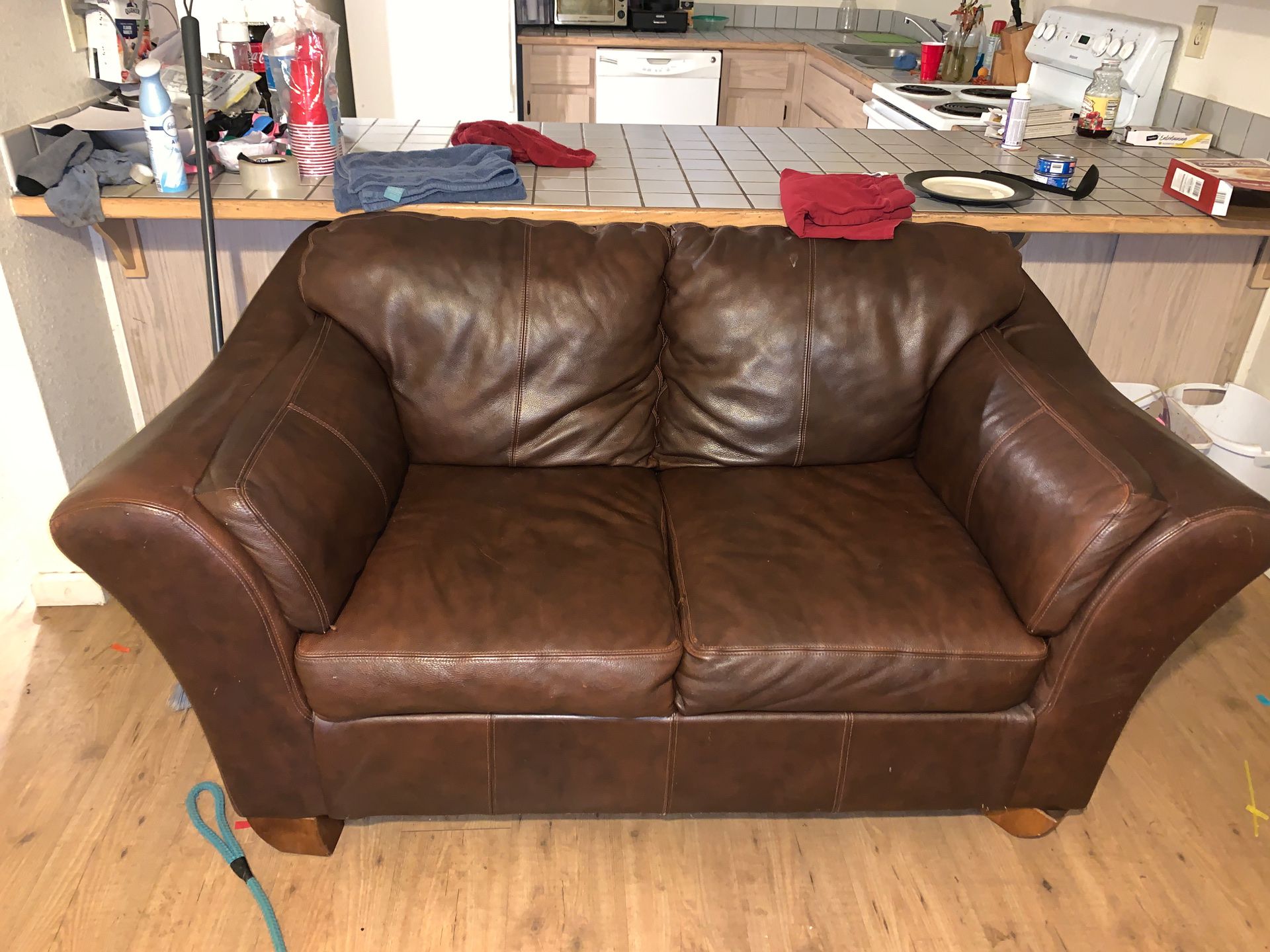 Brown love seat for sell