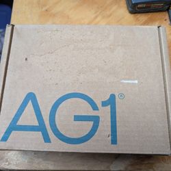 AG1 Nutrition Box Complete Box With Scoop And Stuff In It