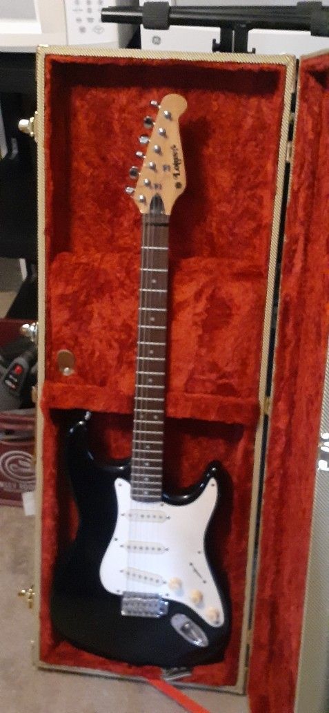 2 ELECTRIC GUITARS WITH HARD SHELL CASES $100 EACH OR BOTH FOR $150 CLICK ON PICTURE YOU WILL GET FULL PICTURE SIZE 