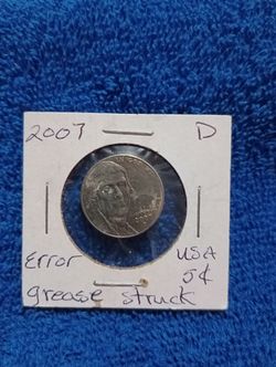 Coin..2007 D Nickel... (Error).. Grease Strike