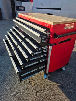 Milwaukee
Tool Storage 52 in. W x 22 in. D Heavy Duty Red Mobile Workbench Cabinet has a dents