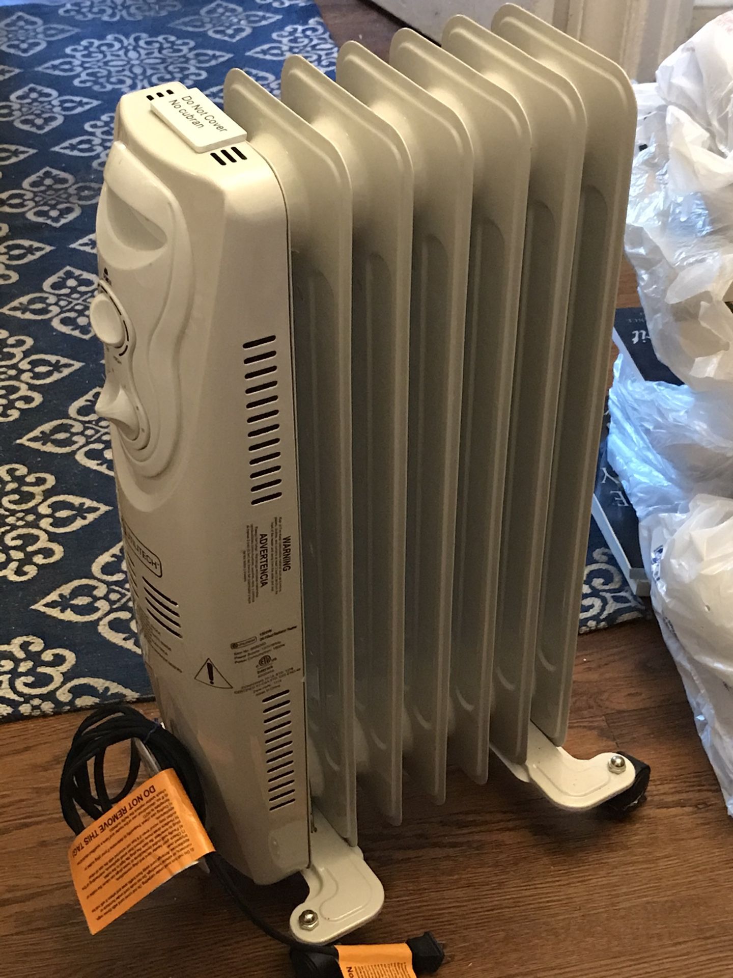 Utilitech 1500W Oil Filled Electric Radiator Heater ~ Like New for Sale in  Dunn, NC - OfferUp